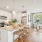 kitchen with an island and bar stools
