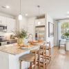 kitchen and dining area with large windows