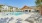 pool in a courtyard with resort-style chairs