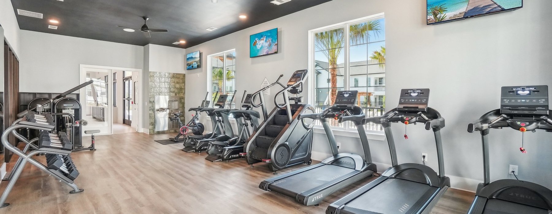 fitness center with exercise equipment