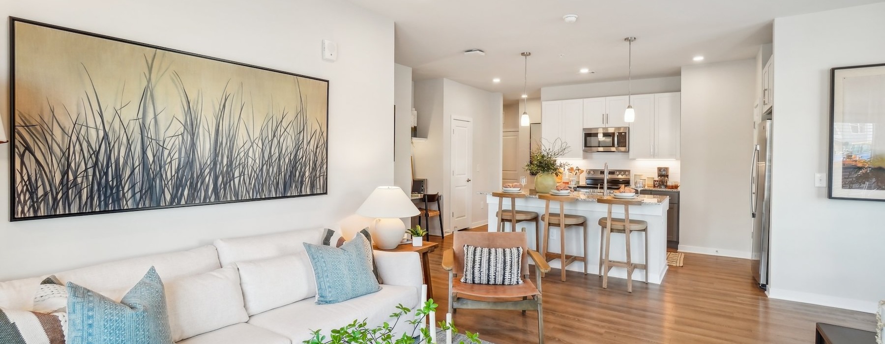 living room with white couch and a coffee table