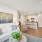 living room with white couch and a coffee table