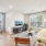 living room and dining area with large windows